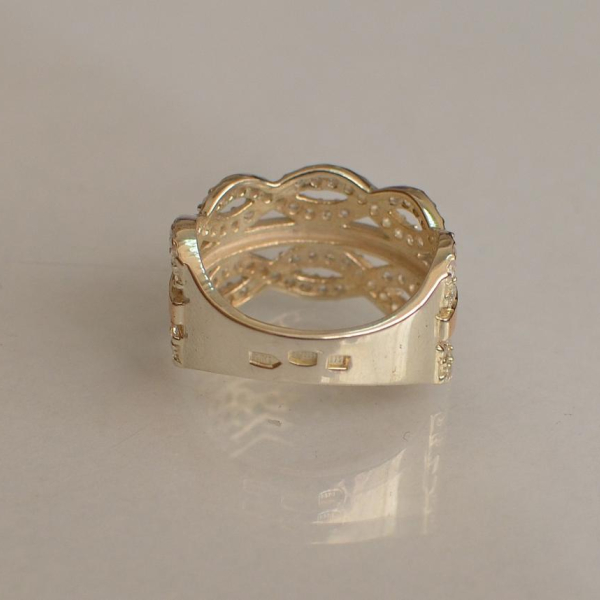 Срібна каблучка з золотими вставками