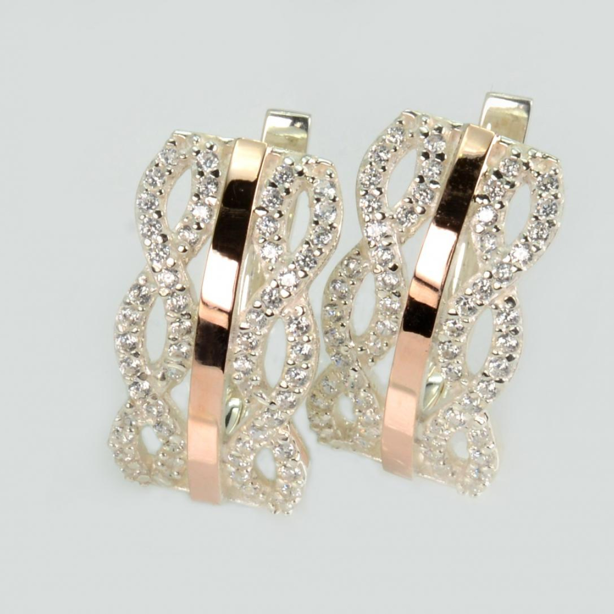 Срібні сережки з золотими вставками