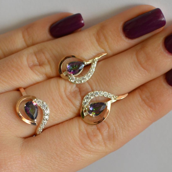 Срібний набір з золотими пластинами