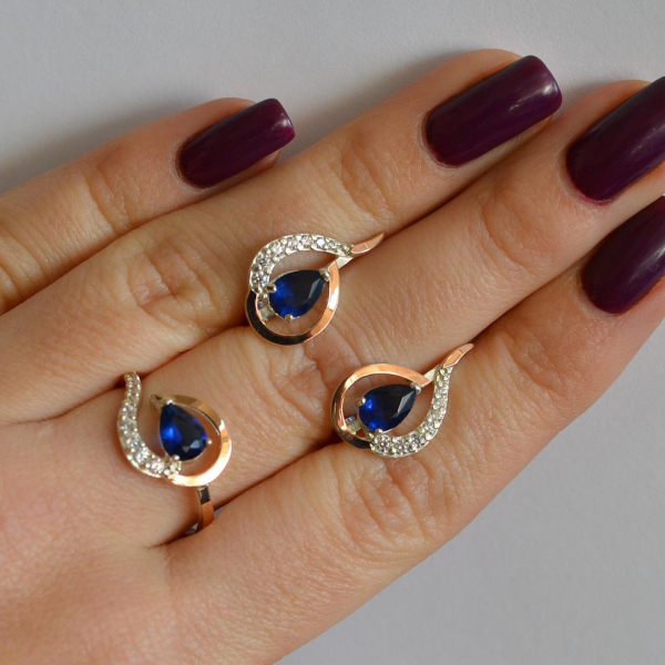 Срібний набір з золотими пластинами