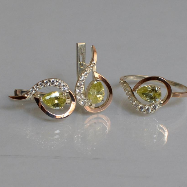 Срібний набір з золотими пластинами