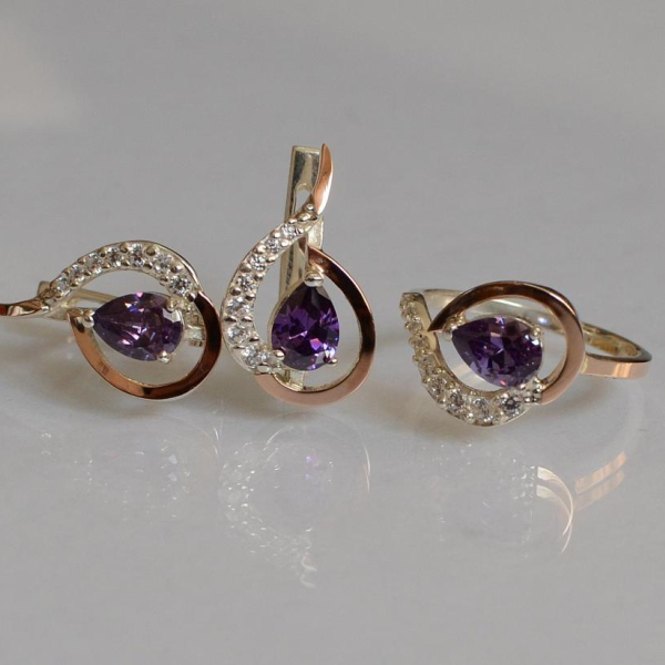 Срібний набір з золотими пластинами