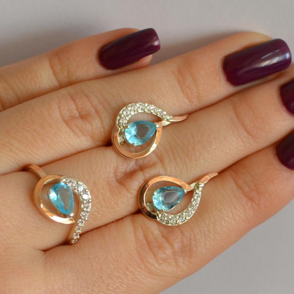 Срібний набір з золотими пластинами