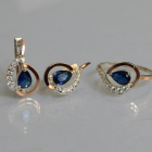 Срібний набір з золотими пластинами