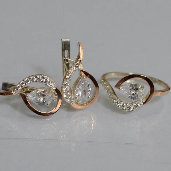 Срібний набір з золотими пластинами