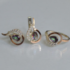 Срібний набір з золотими пластинами