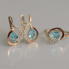 Срібний набір з золотими пластинами