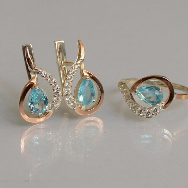 Срібний набір з золотими пластинами