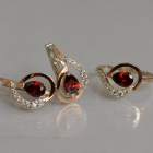 Срібний набір з золотими пластинами