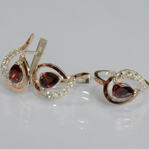 Срібний набір з золотими пластинами