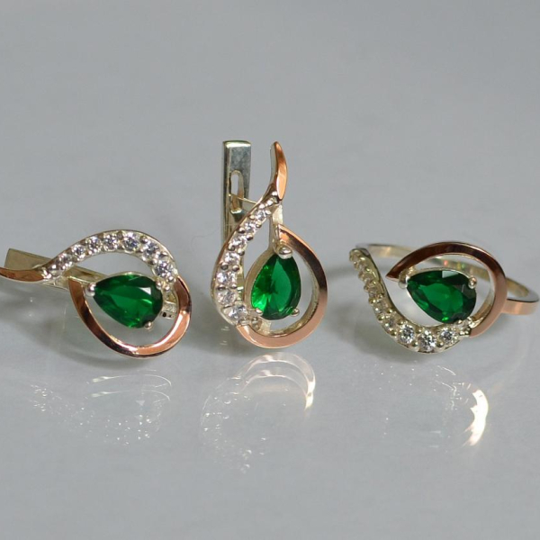 Срібний набір з золотими пластинами