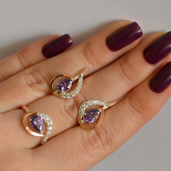 Срібний набір з золотими пластинами