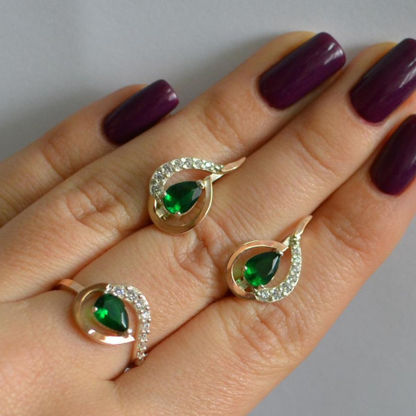 Срібний набір з золотими пластинами