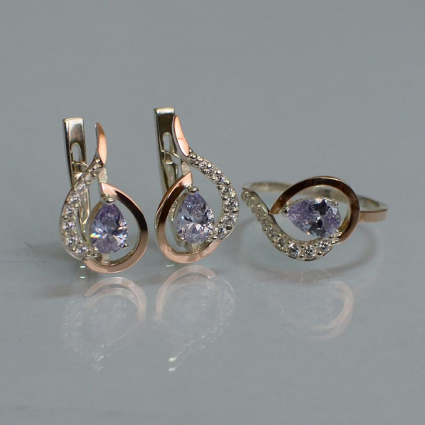 Срібний набір з золотими пластинами