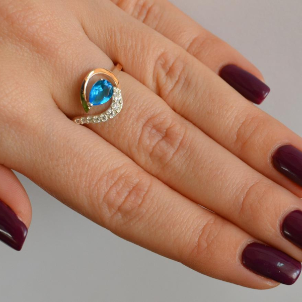 Серебряное кольцо с золотыми вставками