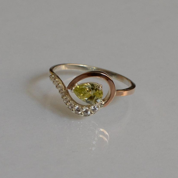 Серебряное кольцо с золотыми вставками