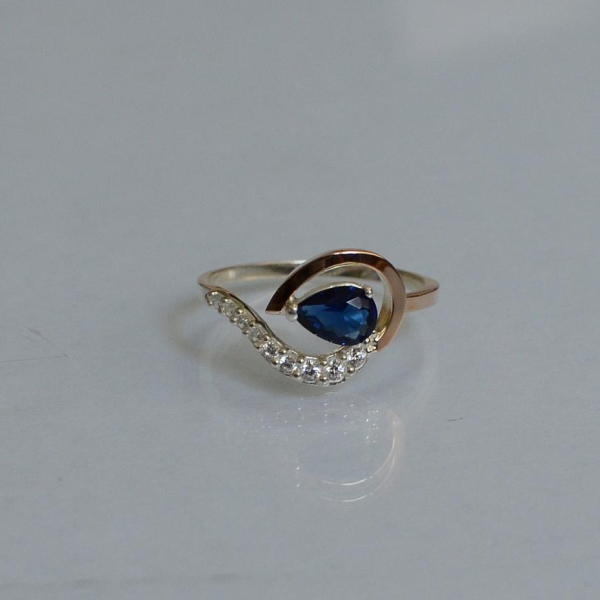 Серебряное кольцо с золотыми вставками