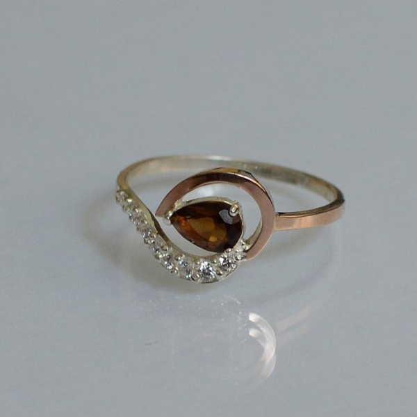 Серебряное кольцо с золотыми вставками