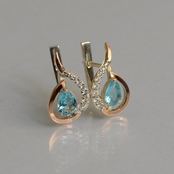 Срібні сережки з золотими вставками