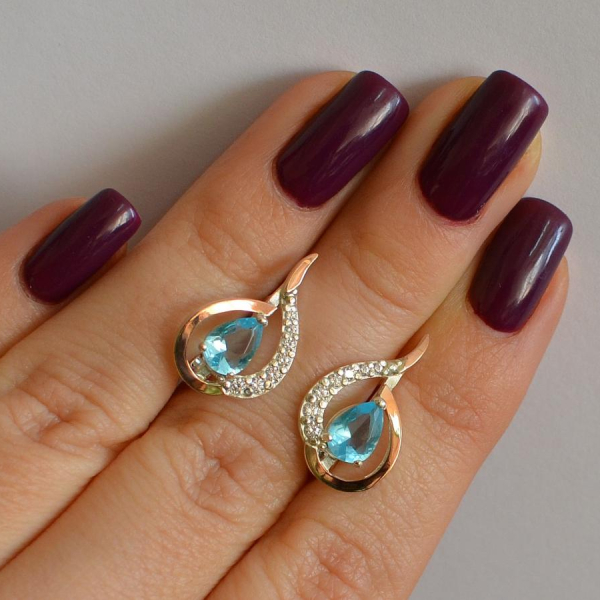 Срібні сережки з золотими вставками