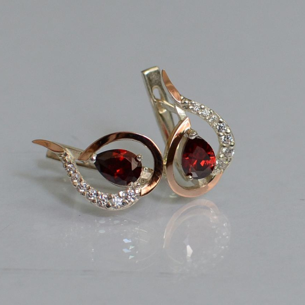 Срібні сережки з золотими вставками