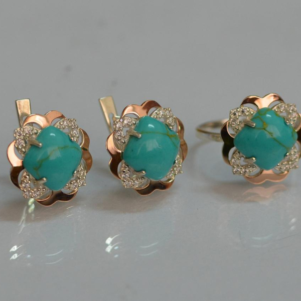 Срібний набір з золотими пластинами