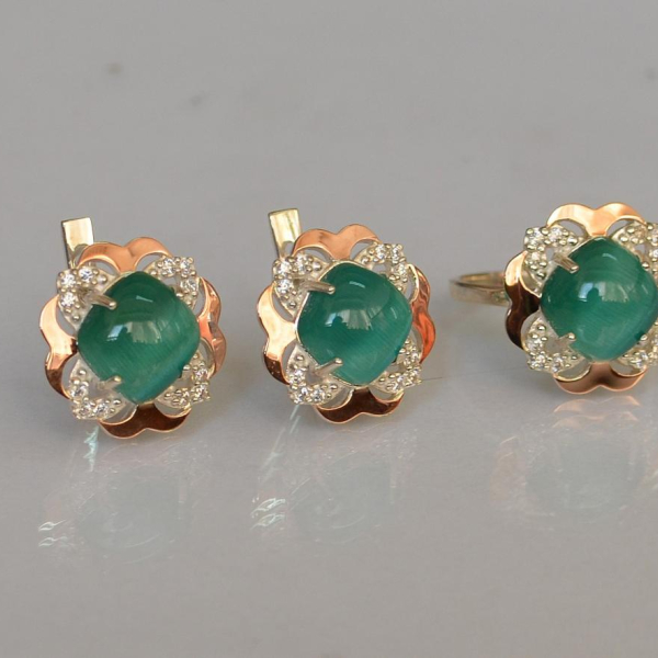 Срібний набір з золотими пластинами