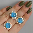 Срібний набір з золотими пластинами