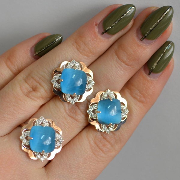 Срібний набір з золотими пластинами