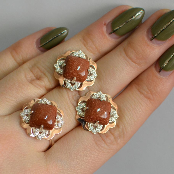 Срібний набір з золотими пластинами