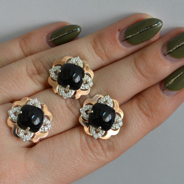 Срібний набір з золотими пластинами