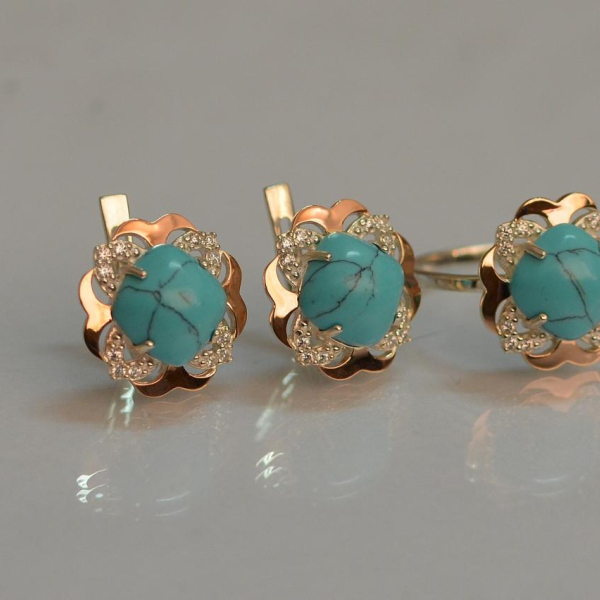 Срібний набір з золотими пластинами