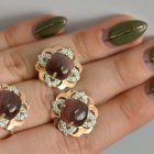 Срібний набір з золотими пластинами