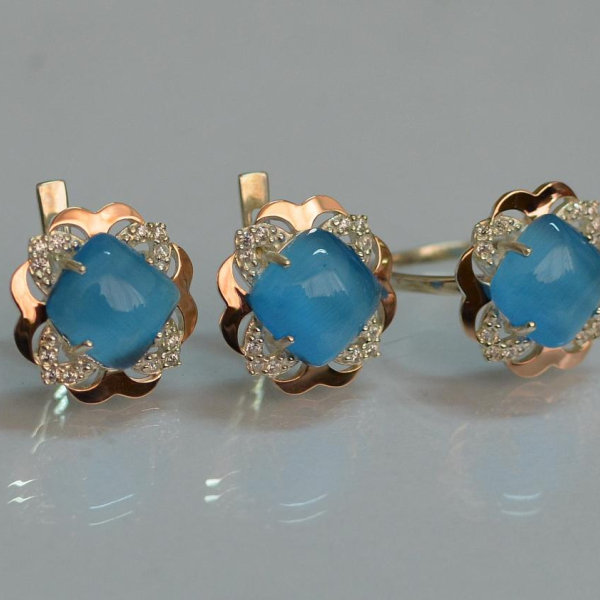 Срібний набір з золотими пластинами