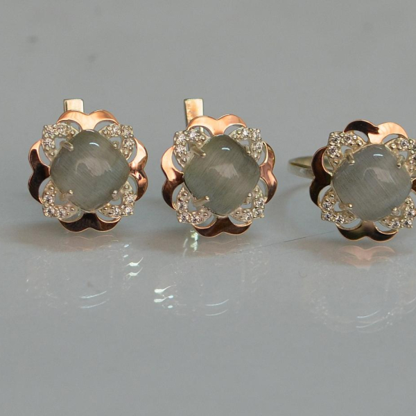 Срібний набір з золотими пластинами