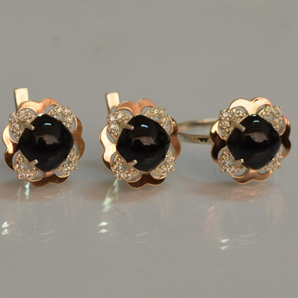 Срібний набір з золотими пластинами