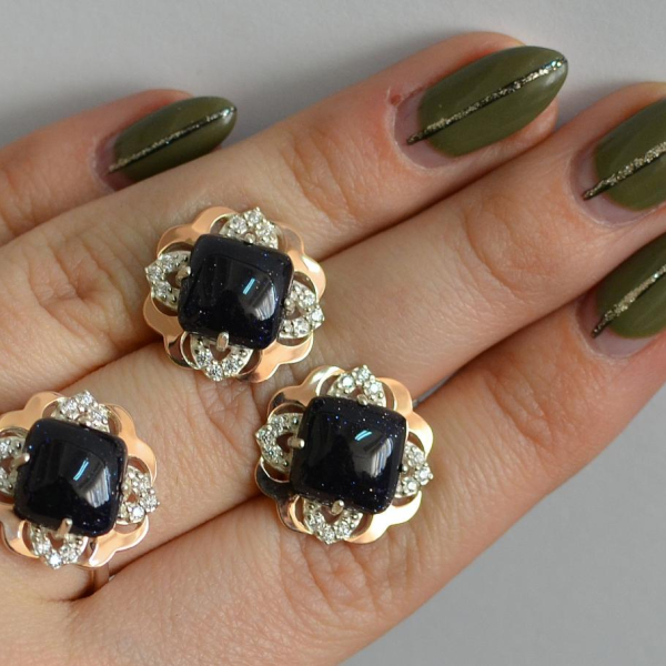 Срібний набір з золотими пластинами