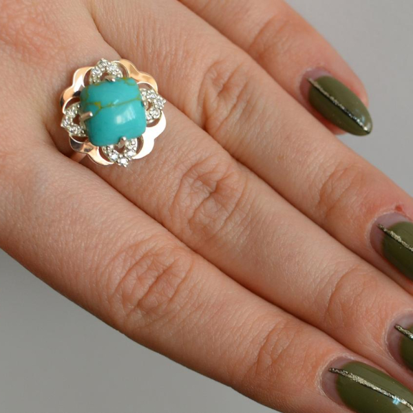 Срібна каблучка з золотими вставками