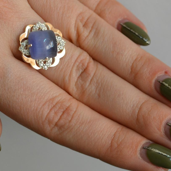 Срібна каблучка з золотими вставками