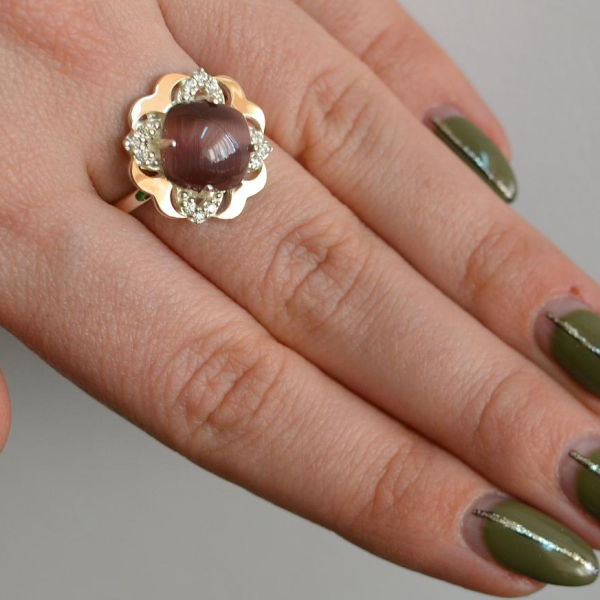 Срібна каблучка з золотими вставками