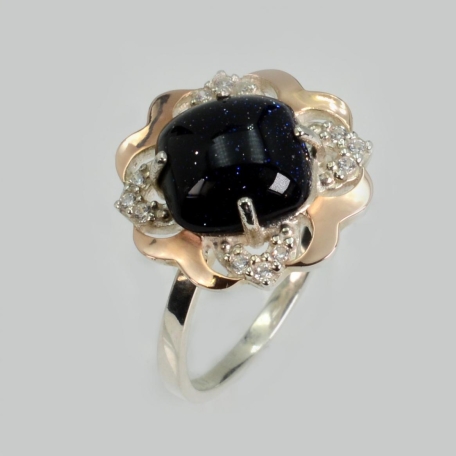 Срібна каблучка з золотими вставками