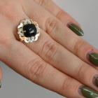 Срібна каблучка з золотими вставками