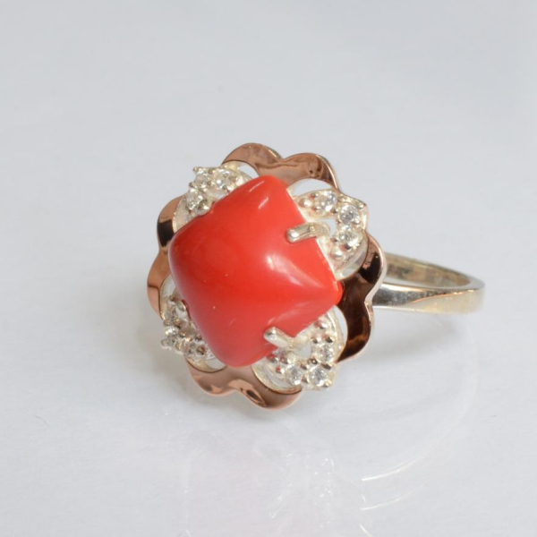 Срібна каблучка з золотими вставками