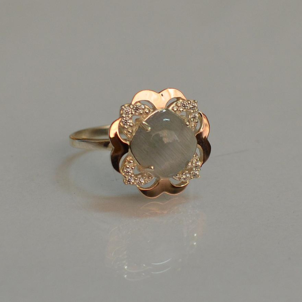 Срібна каблучка з золотими вставками