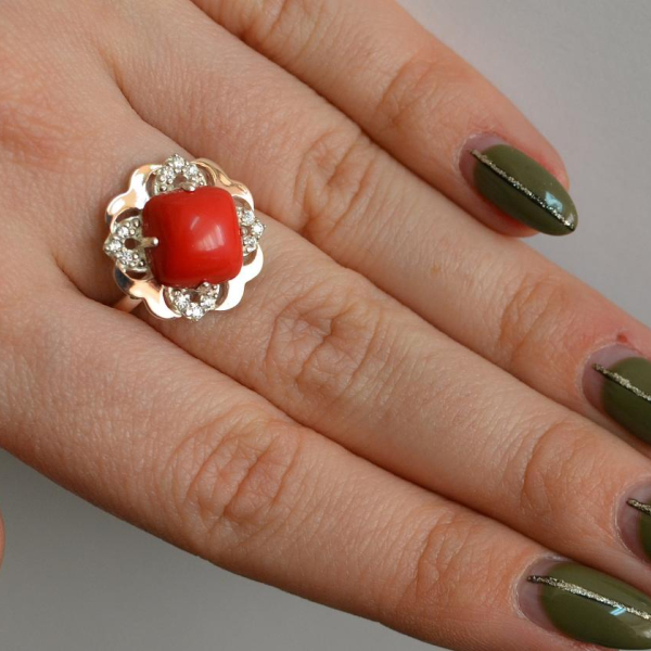 Срібна каблучка з золотими вставками