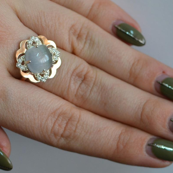 Срібна каблучка з золотими вставками