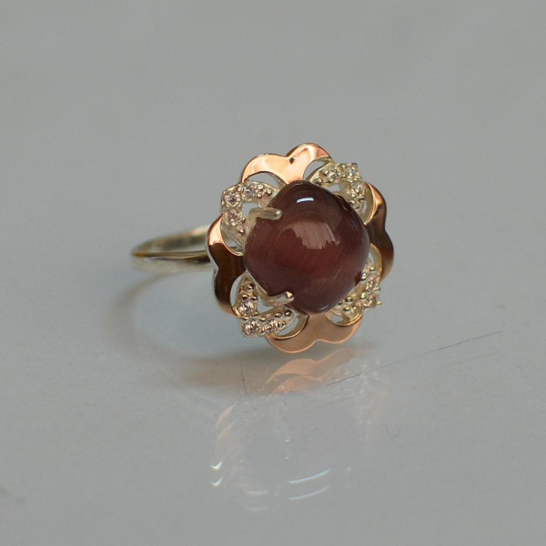 Срібна каблучка з золотими вставками