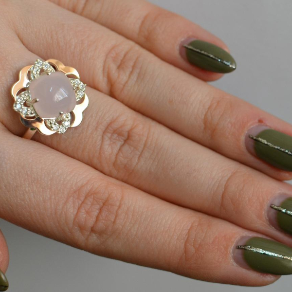 Срібна каблучка з золотими вставками