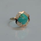 Срібна каблучка з золотими вставками