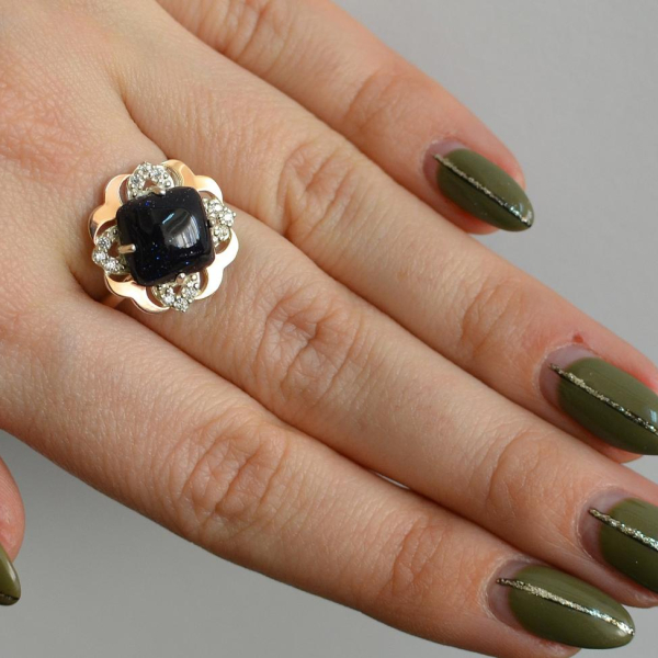 Срібна каблучка з золотими вставками